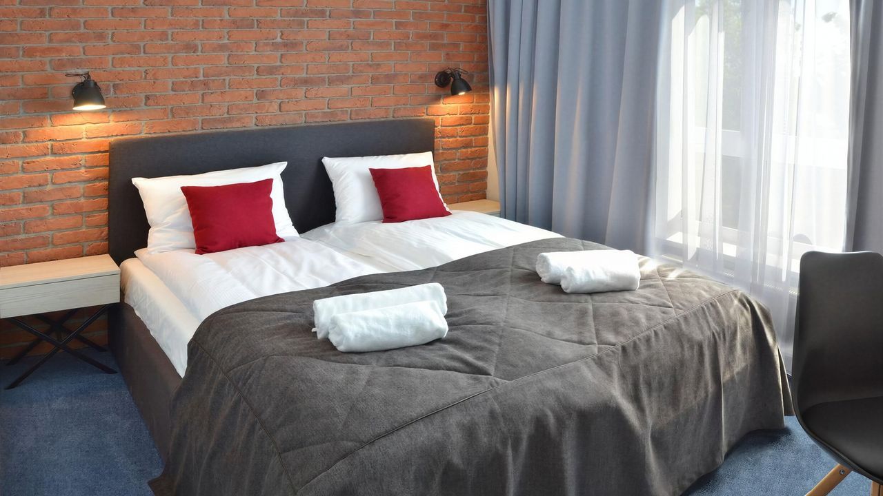 Sypialnia w apartamencie Ogień